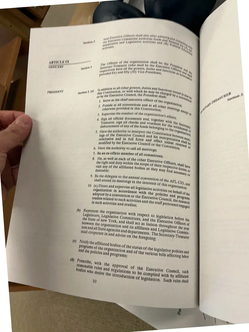 Photograph of a printed constitution: Constitution of the New York State AFL-CIO, as amended 1992 (partial copy), page 13.