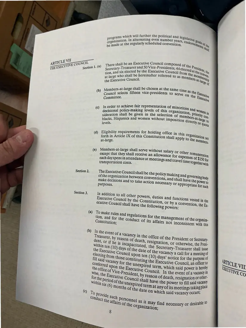 Photograph of a printed constitution: Constitution of the New York State AFL-CIO, as amended 1992 (partial copy), page 11.