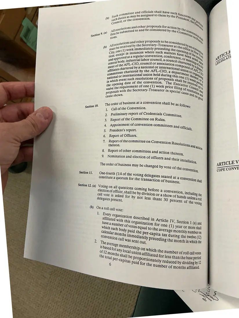 Photograph of a printed constitution: Constitution of the New York State AFL-CIO, as amended 1992 (partial copy), page 9.