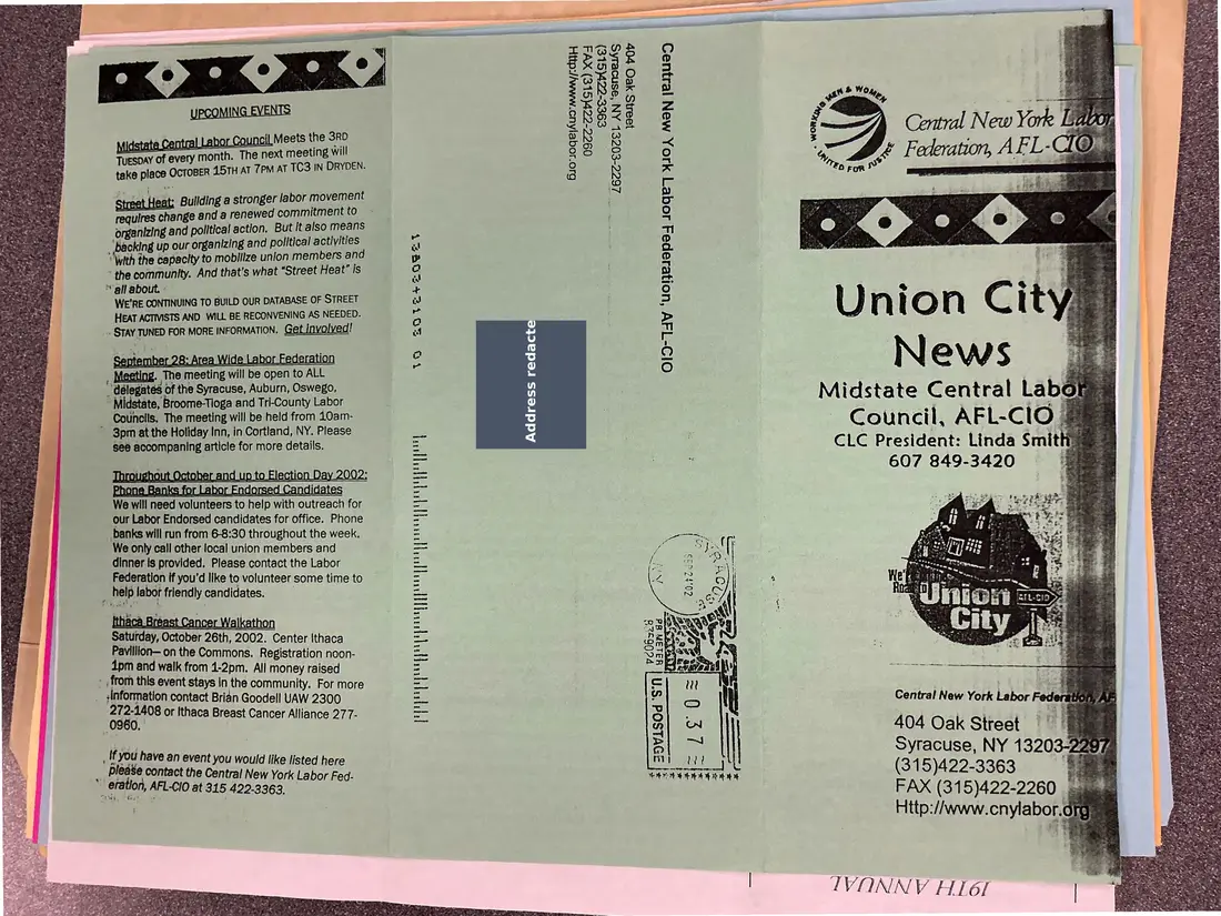 Photograph of a newsletter: Union City News, Midstate Central Labor Council, October 2002, page 1.