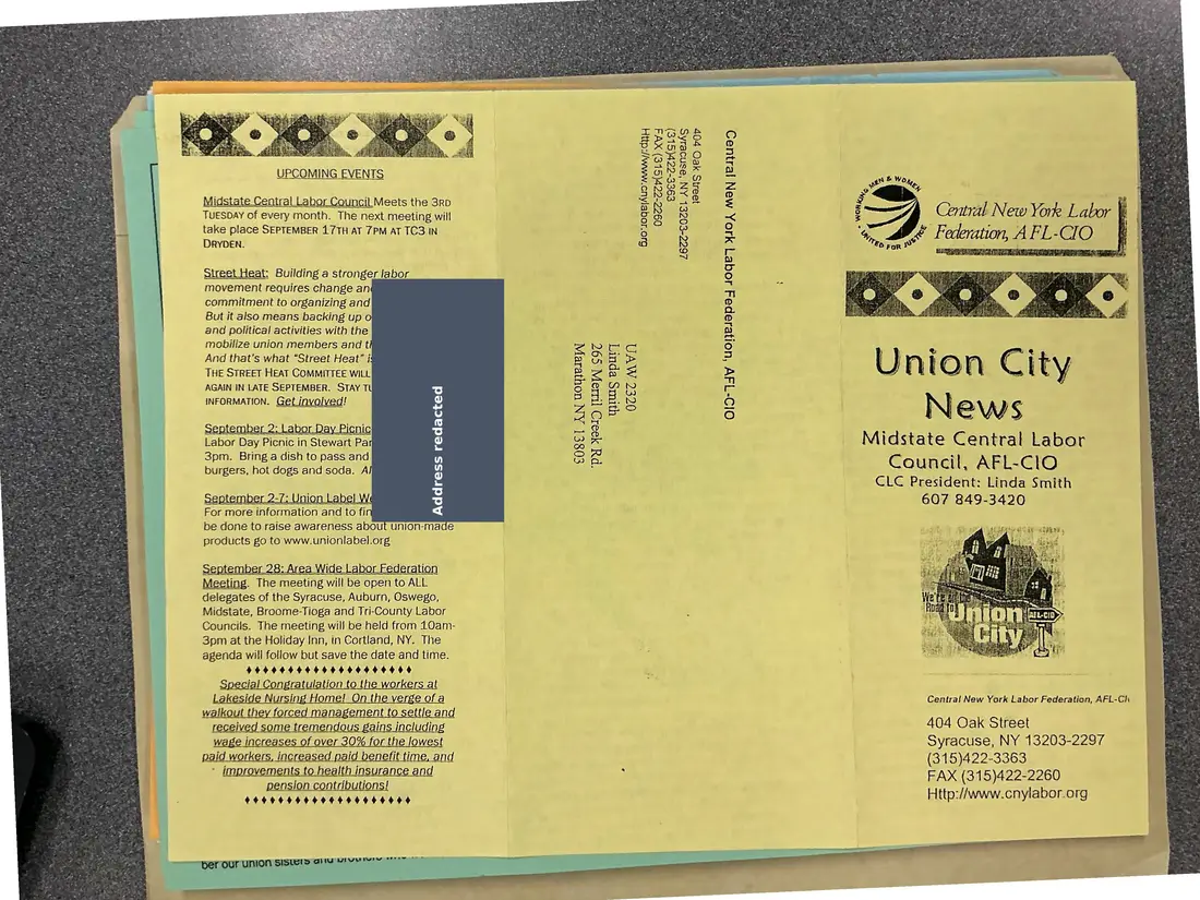 Photograph of a newsletter: Union City News, Midstate Central Labor Council, September 2002, copy 2, page 1.