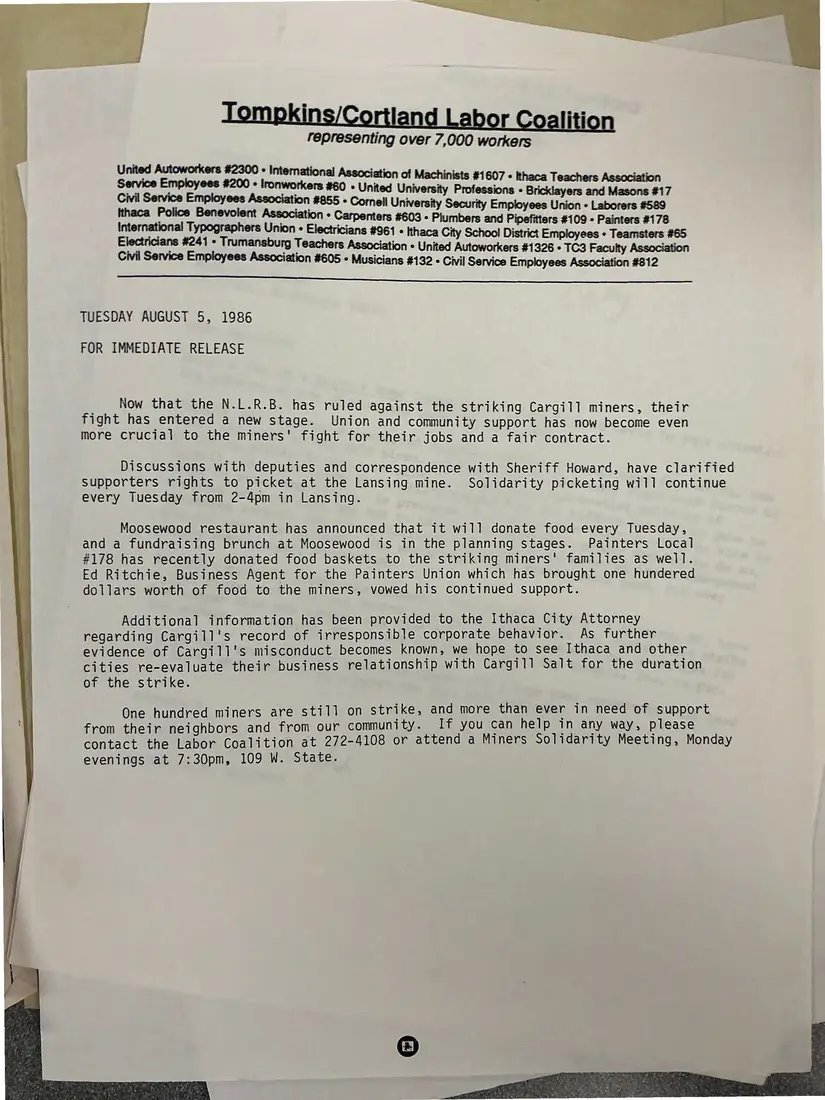 Photograph of a press release: Labor Coalition press release: NLRB rules against the striking Cargill miners, page 1.
