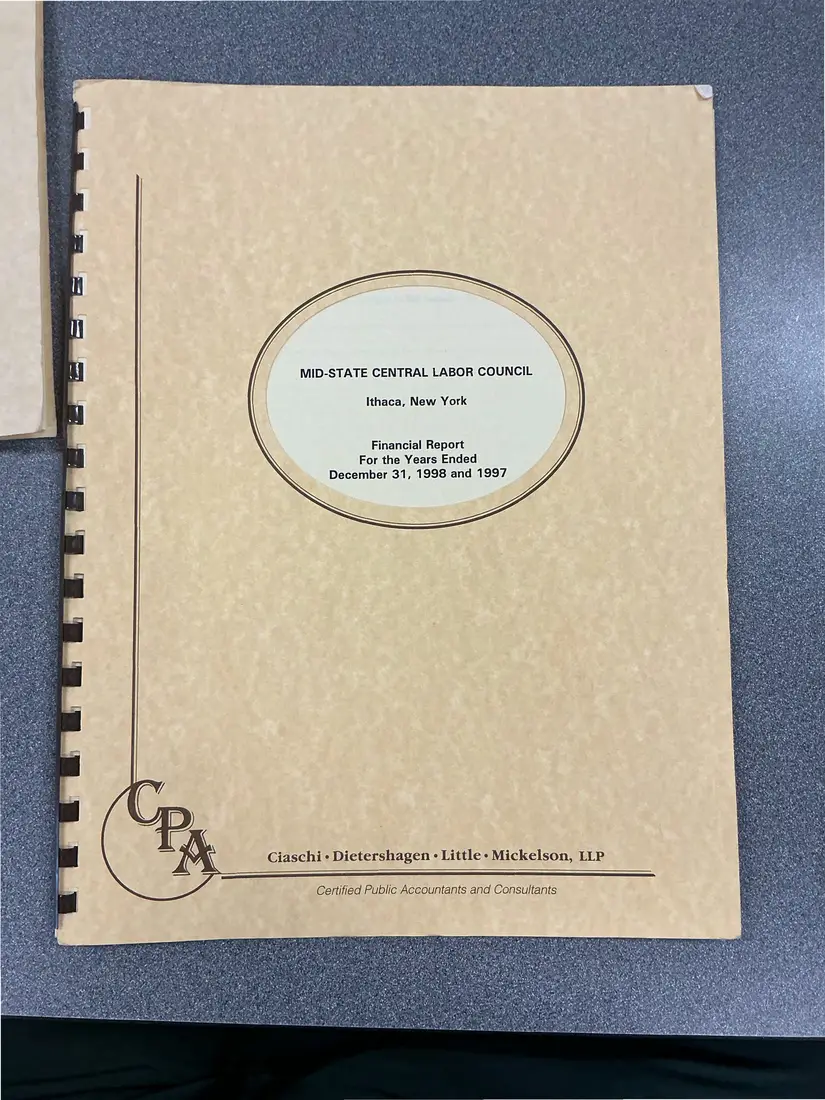 Photograph of a financial report: Midstate Central Labor Council financial report, 1998 and 1997, page 1.