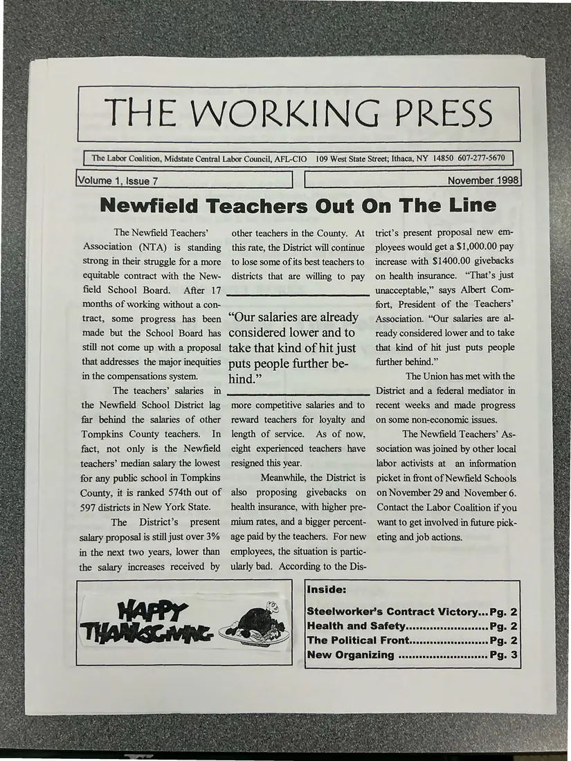 Photograph of a newsletter: The Working Press, Volume 1, Issue 7, November 1998, page 1.