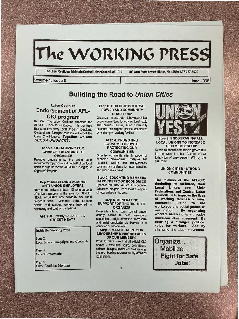 Photograph of a newsletter: The Working Press, Volume 1, Issue 6, June 1998: “Building the Road to Union Cities”, page 1.