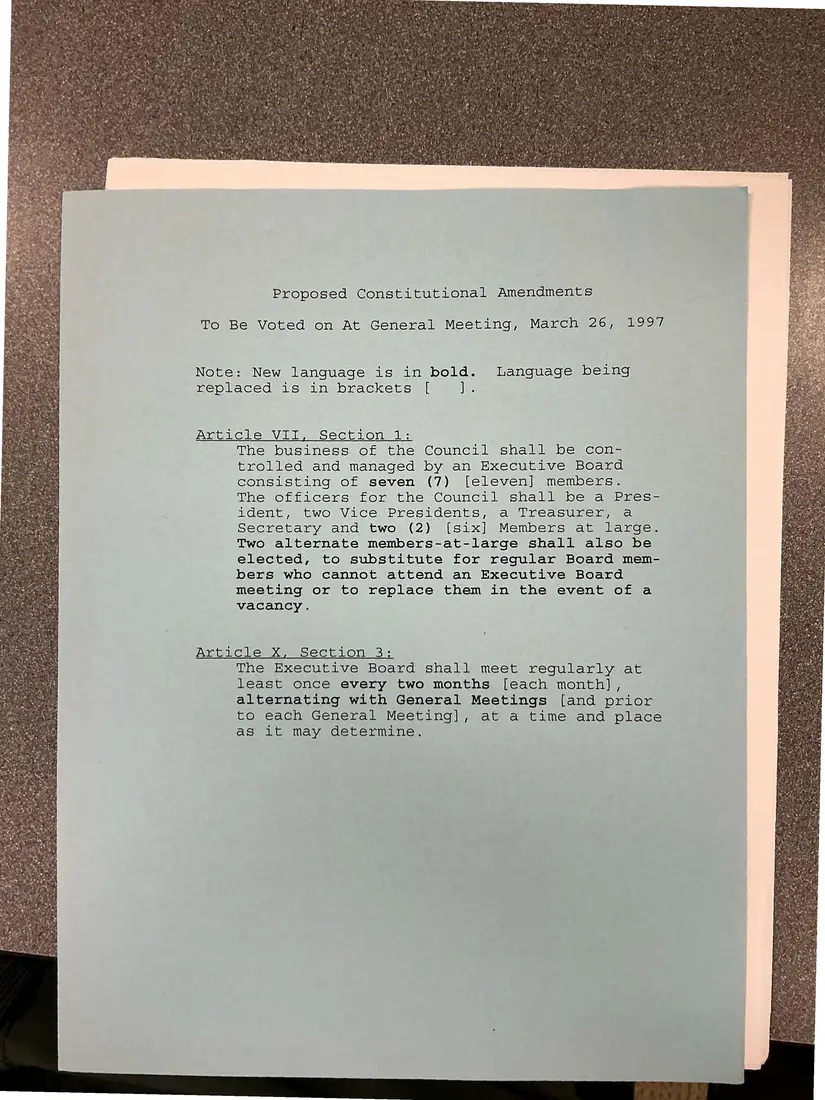 Photograph of a meeting notice: General meeting notice, March 26 [1997], with proposed constitutional amendments, page 2.