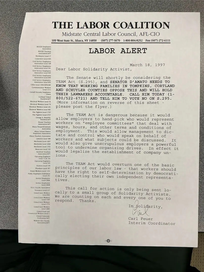 Photograph of a flyer: LABOR ALERT on the TEAM Act (S. 295), with “clone sheep” flyer, page 1.