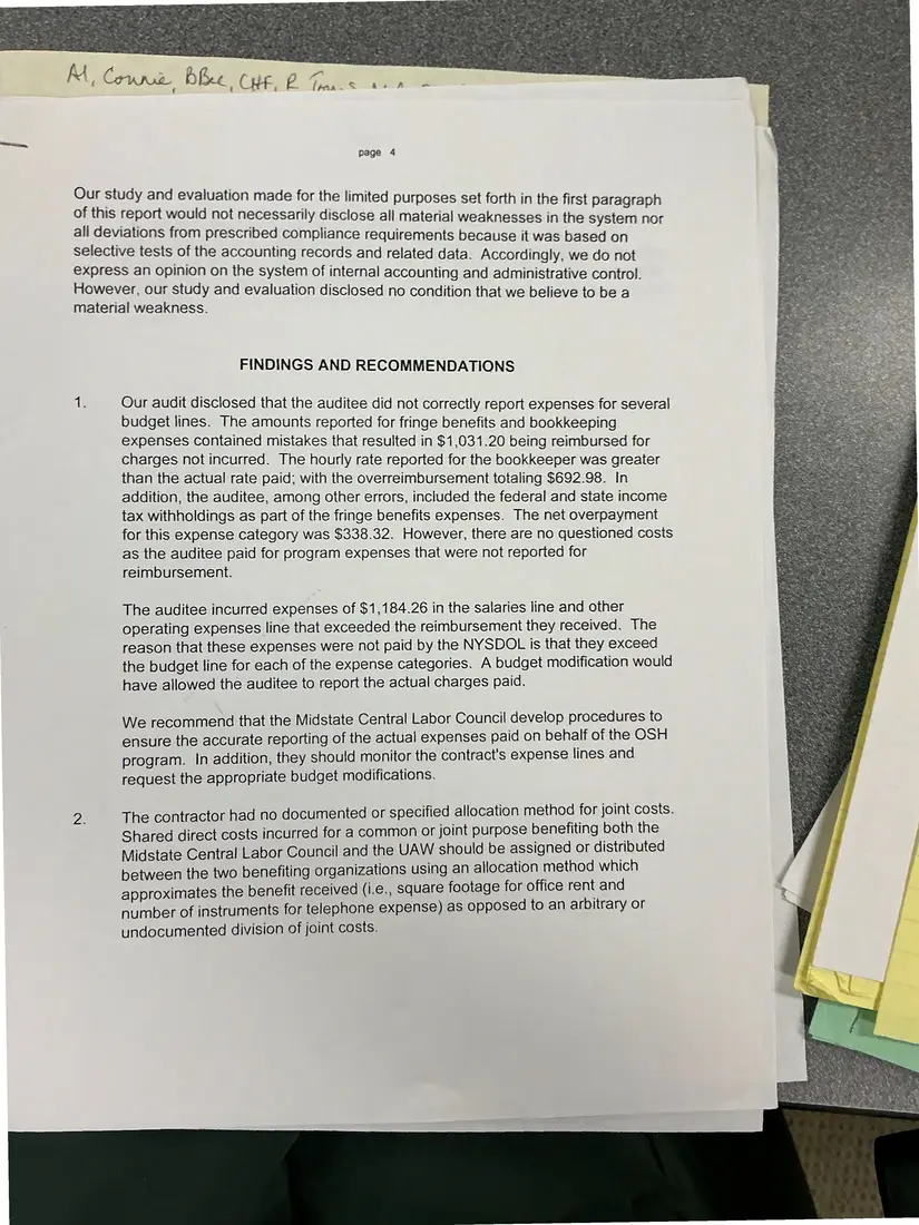 Photograph of a report: New York State Department of Labor audit findings (pages 4–5), page 1.