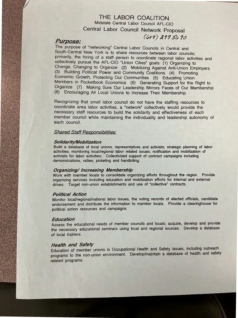 Photograph of a proposal: “Central Labor Council Network Proposal” (blue copy), page 1.