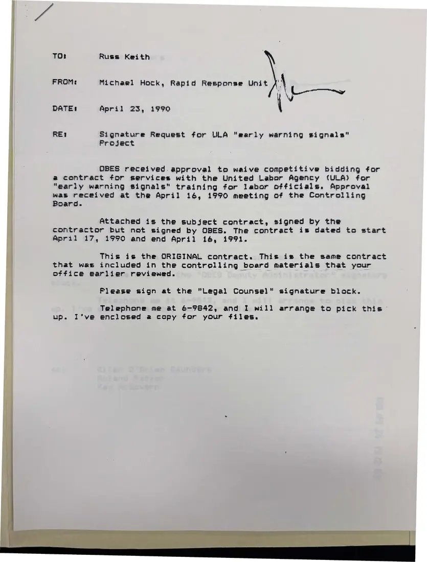 Photograph of a memorandum: Memo on the “early warning signals” training contract, page 1.