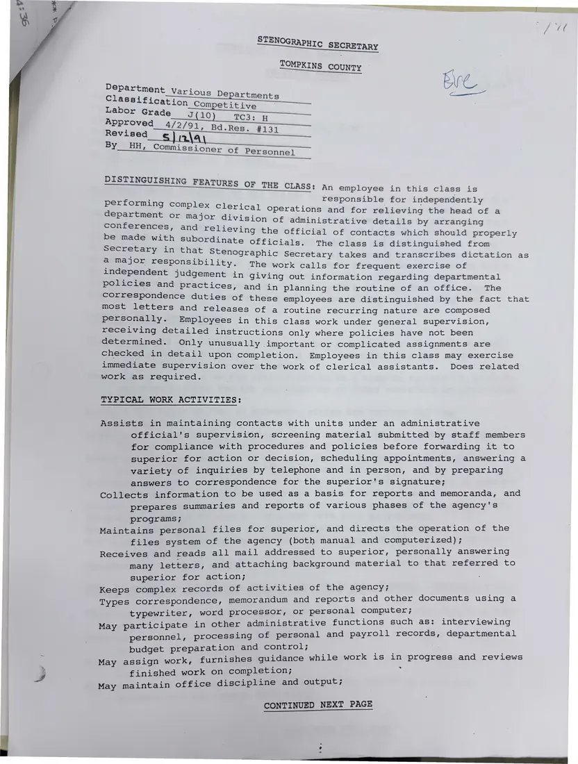 Photograph of a memorandum: Library memo on removing two confidential positions from the UAW 2300 unit, with job descriptions, page 2.