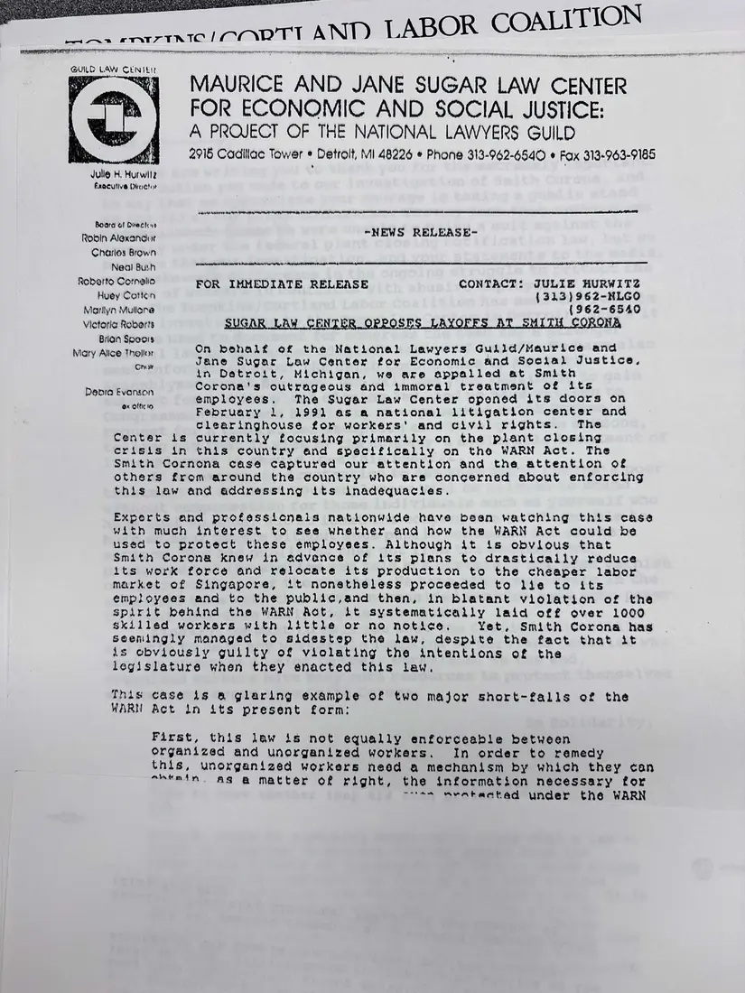 Photograph of a press release: Sugar Law Center news release opposing the Smith Corona layoffs, page 1.