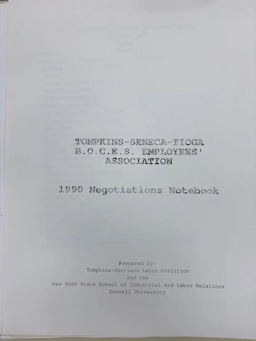 Photograph of a report: 1990 Negotiations Notebook, Tompkins-Seneca-Tioga BOCES Employees' Association, page 1.