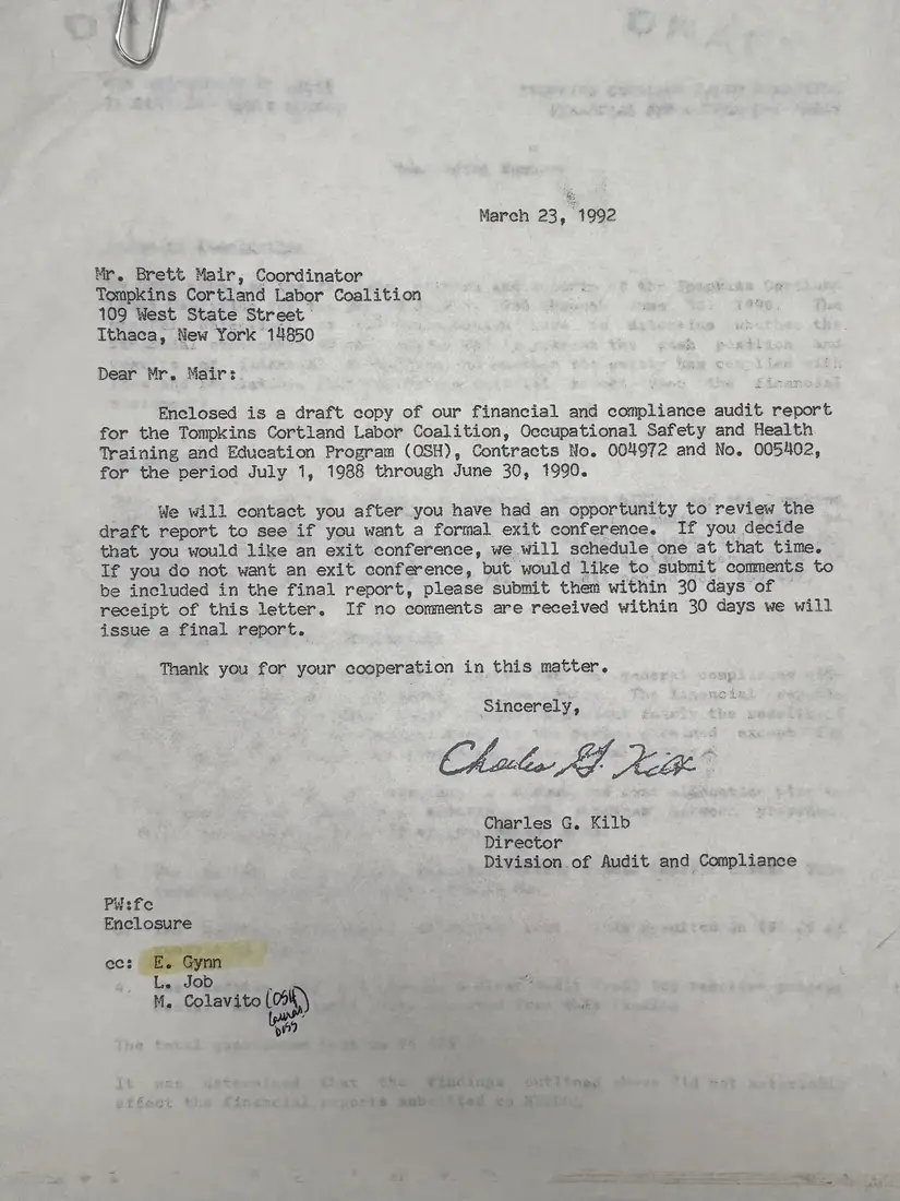 Photograph of a report: Department of Labor financial and compliance audit (draft), contracts 1988–1990, page 1.