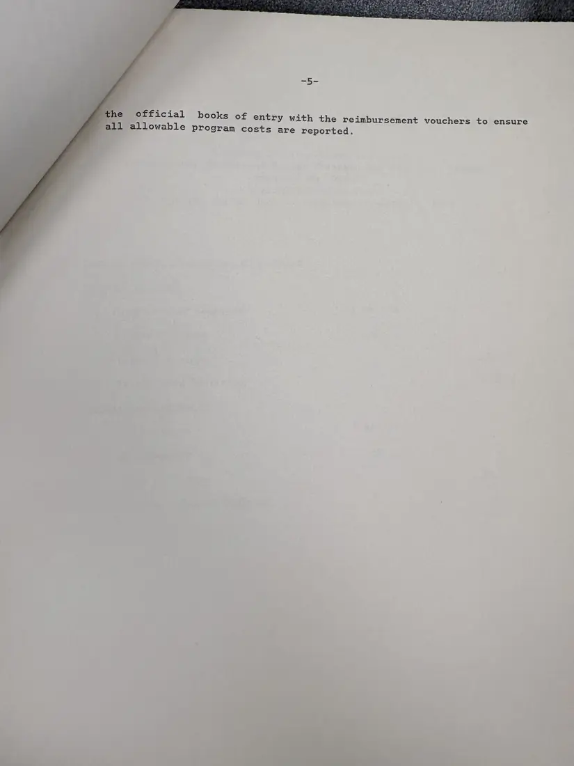 Photograph of a report: Department of Labor financial and compliance audit (draft), contracts 1988–1990, page 9.