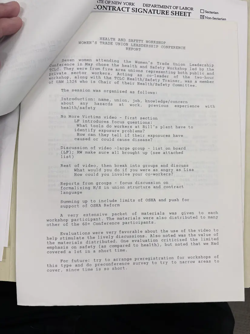 Photograph of a report: Workshop reports: women workers, workers' compensation, and school hazards, 1992, page 1.