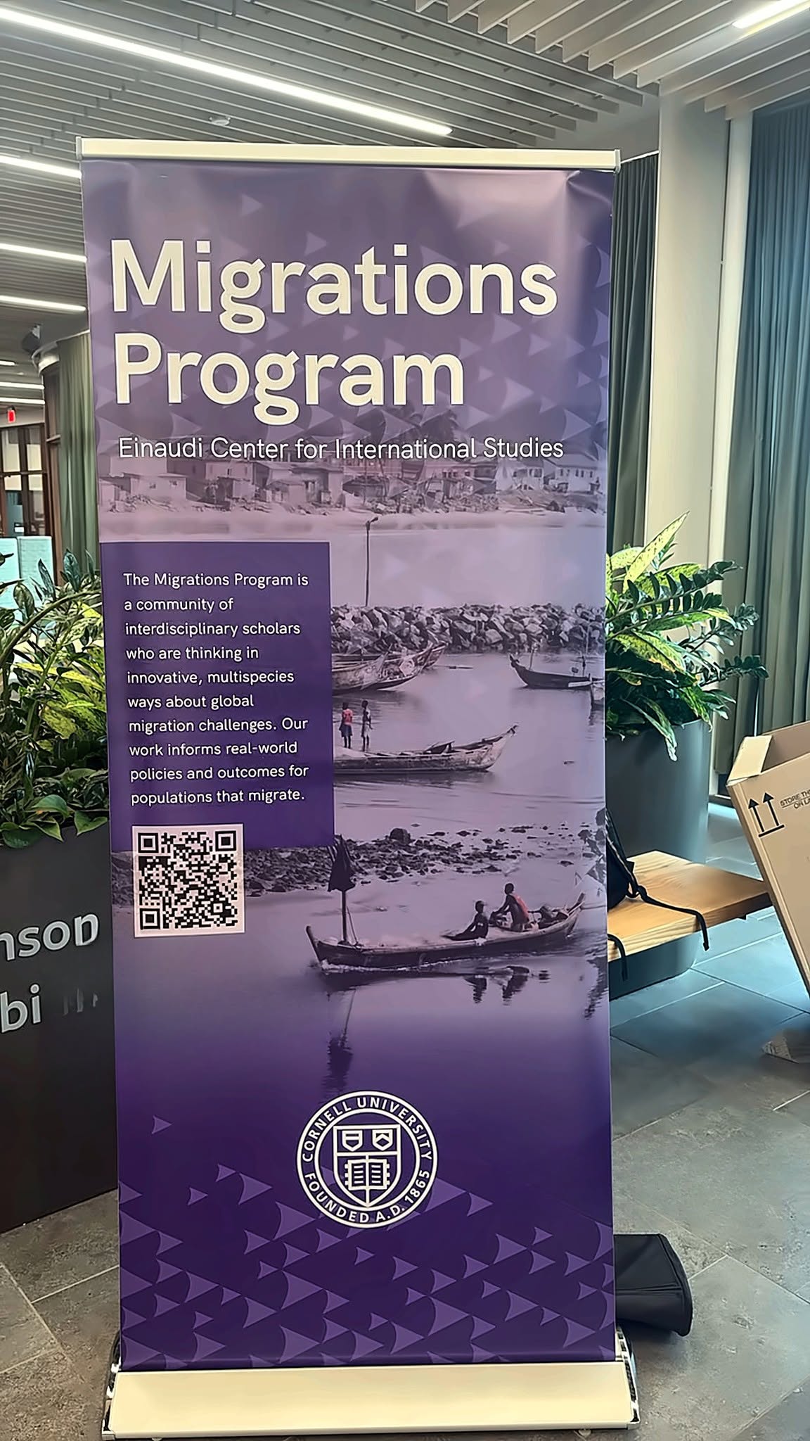 Migrations Program banner from the Einaudi Center for International Studies in the Atkinson Hall lobby
